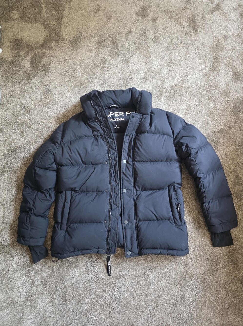 The Super Black Puffer Jacket - Flaws